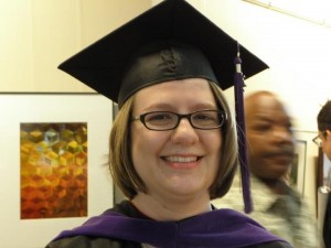 Kathryn Smith wearing graduation cap and gown